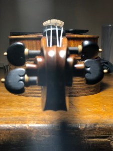 A view sighting down the fingerboard.